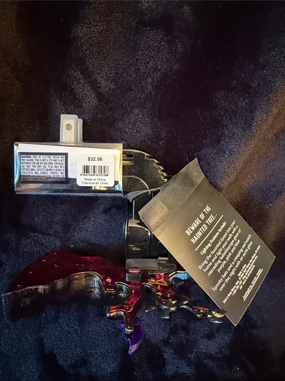 Bath & Body Works Black and Purple Halloween Plug-In Fragrance Warmer.